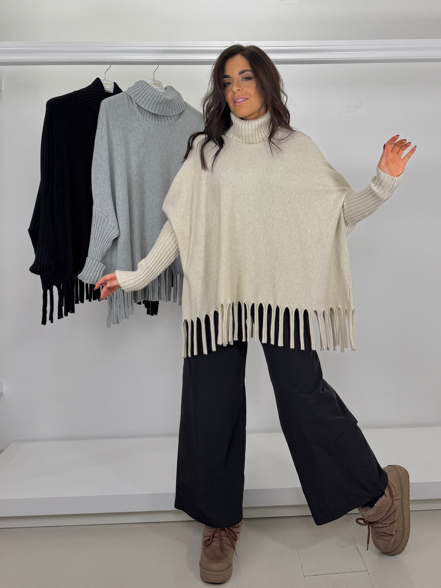 Pullover dolcevita con frange