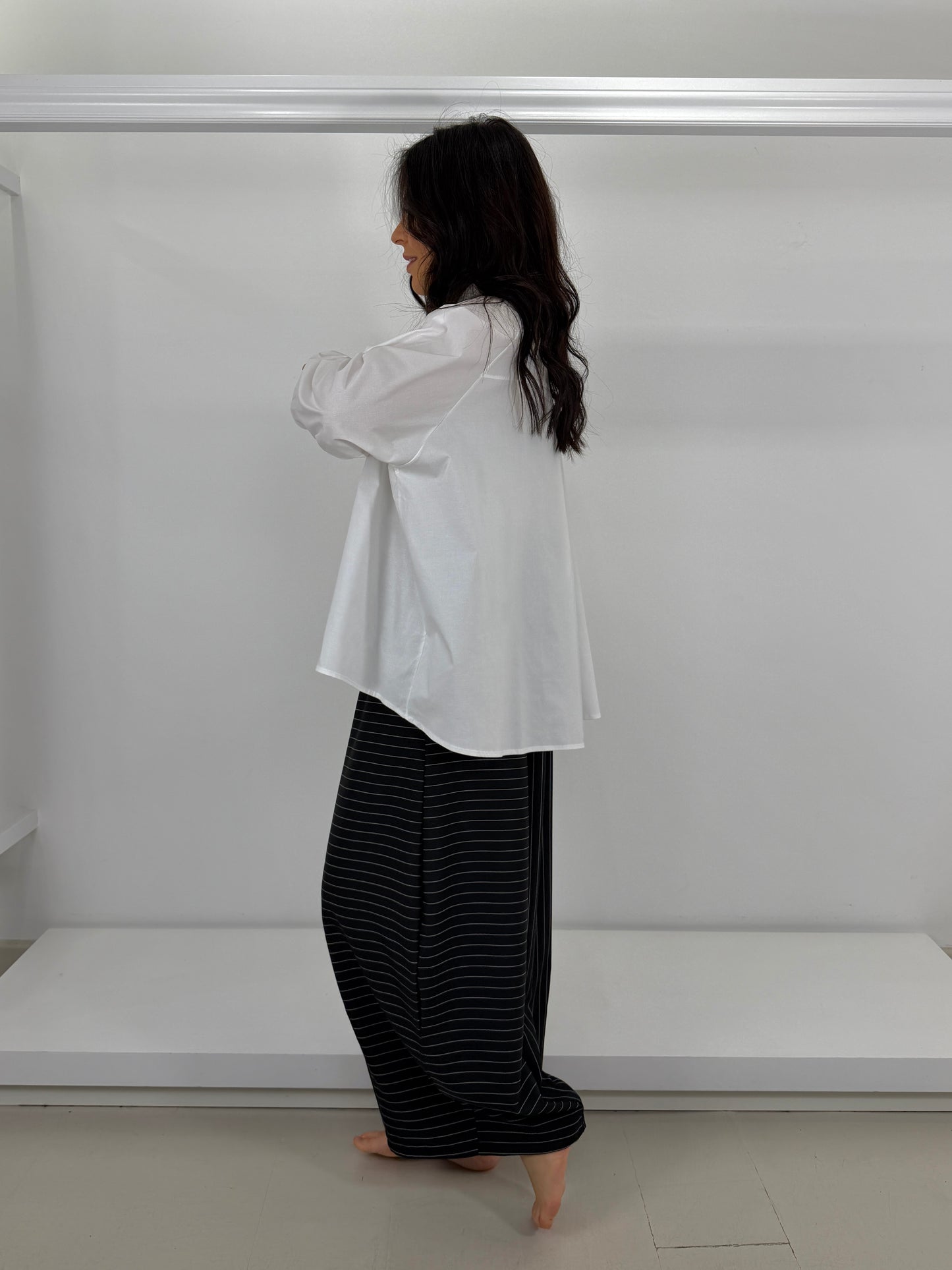 Camicia con tasca chiusura asimmetrica
