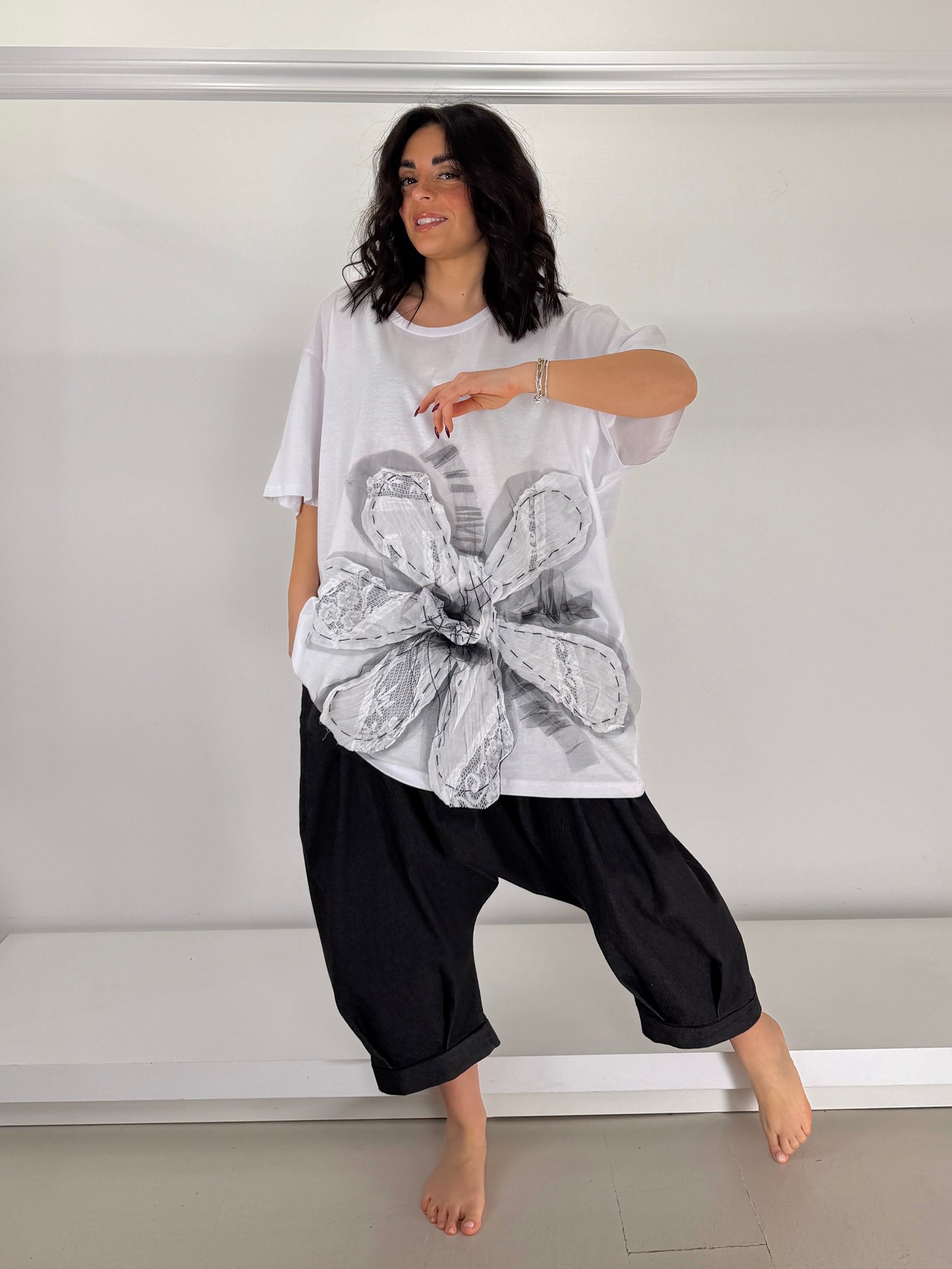 Pantalone effetto jeans cavallo basso