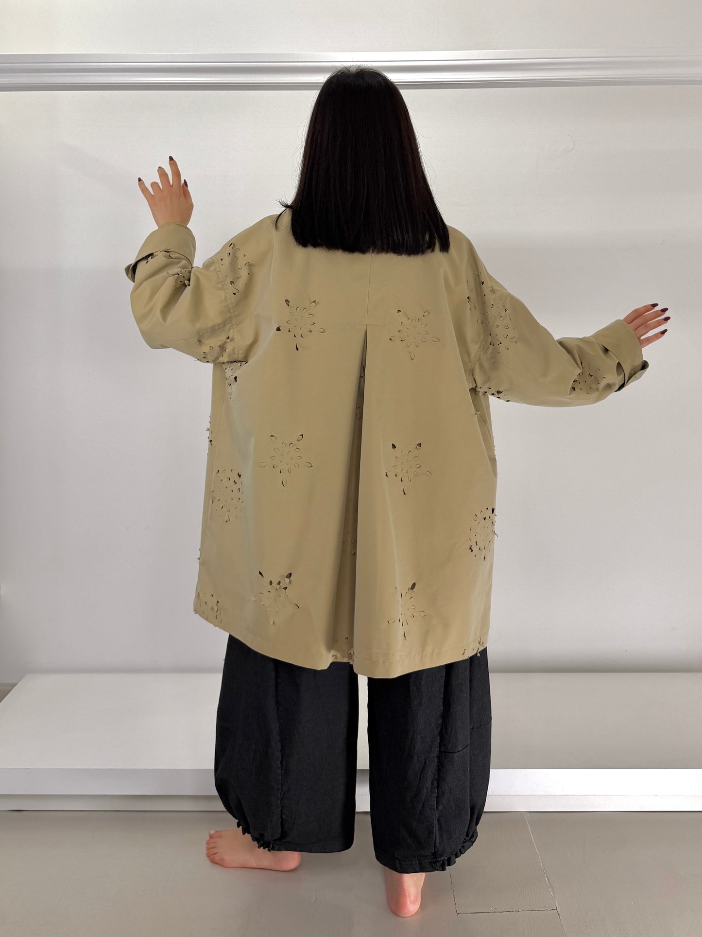 Giacca tagli laser con piegone