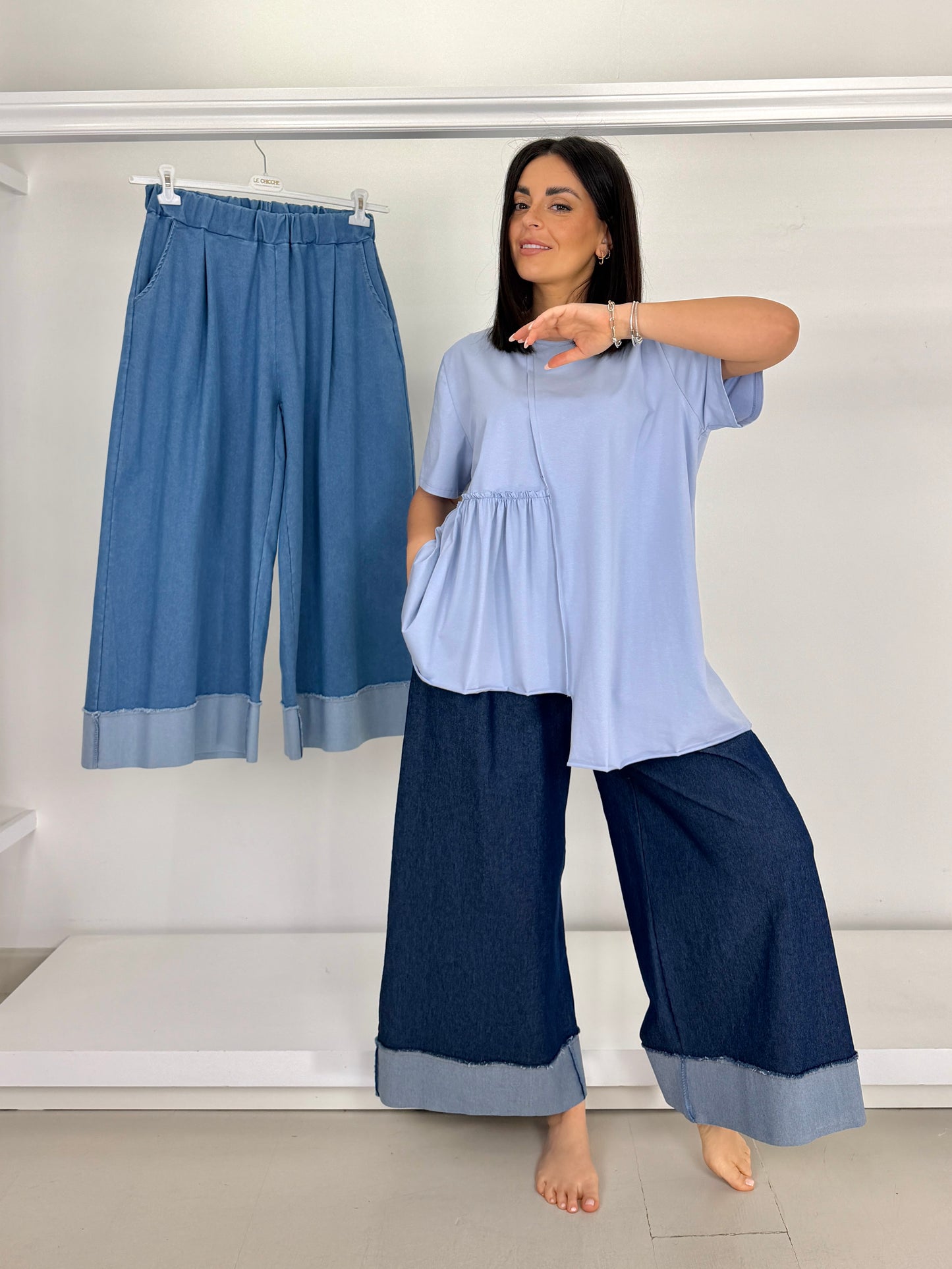 Jeans elasticizzato gamba larga con bordo