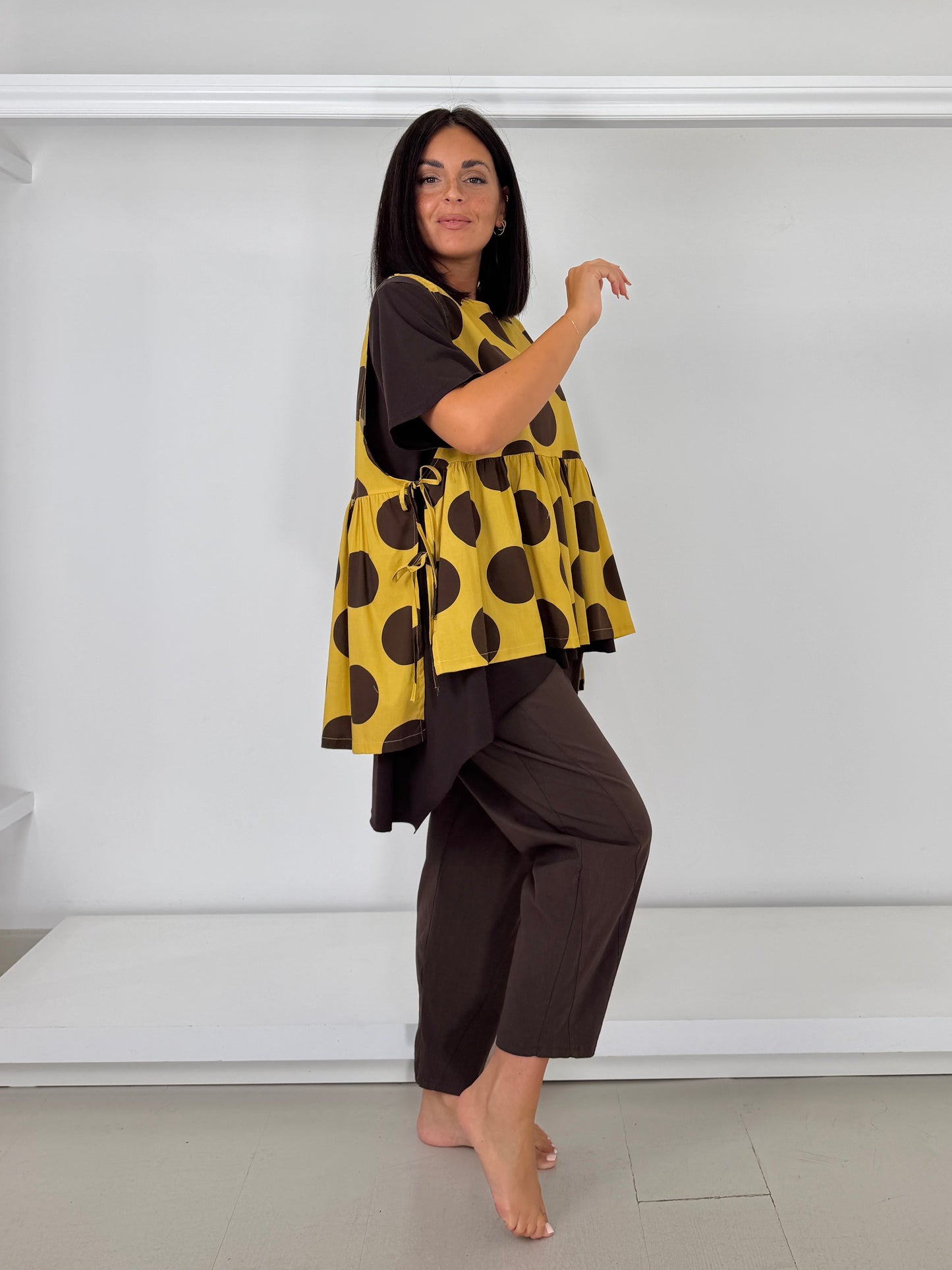 Gilet con fiocchetti - bolli