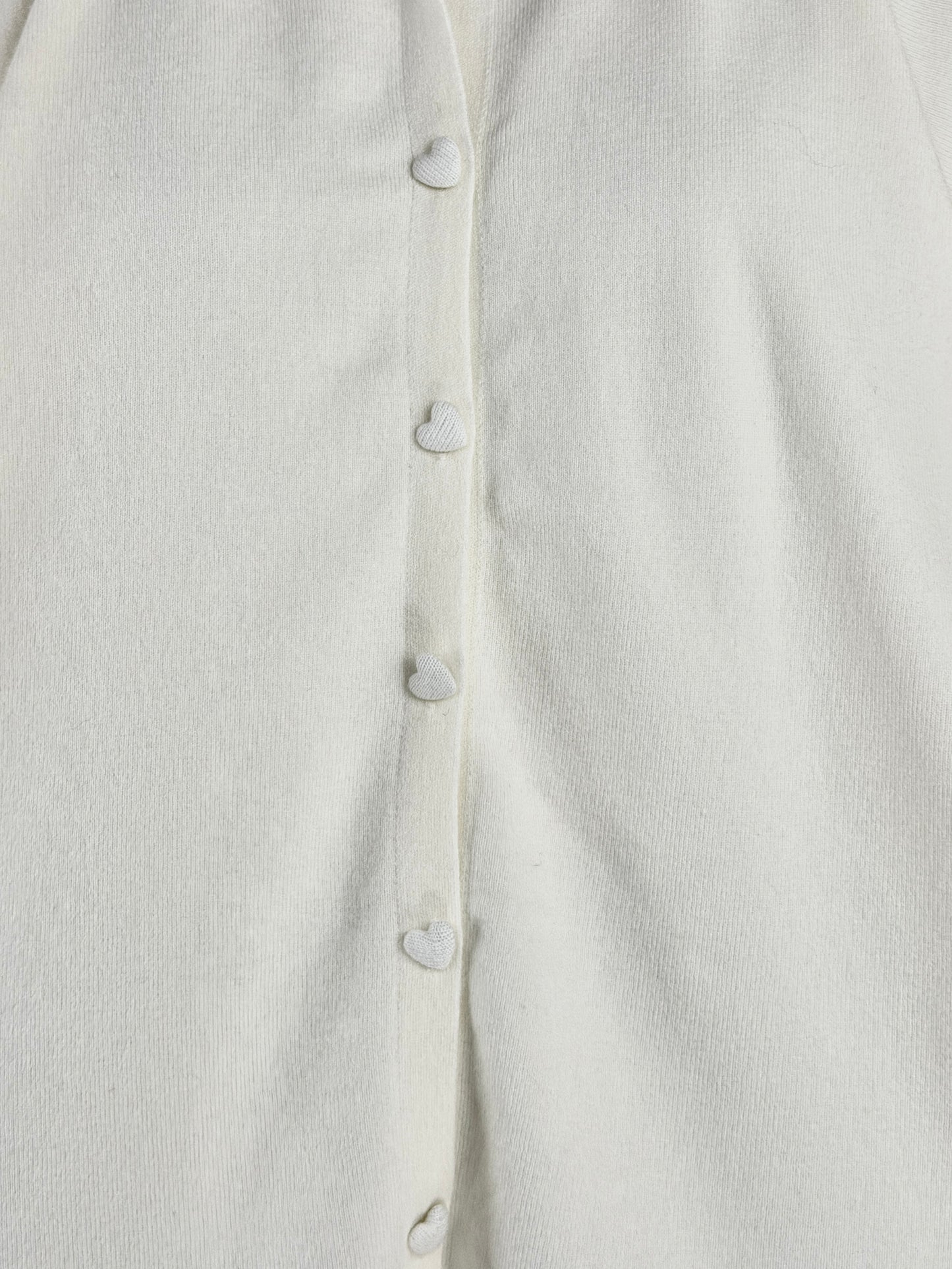 Cardigan bottoncini a cuore