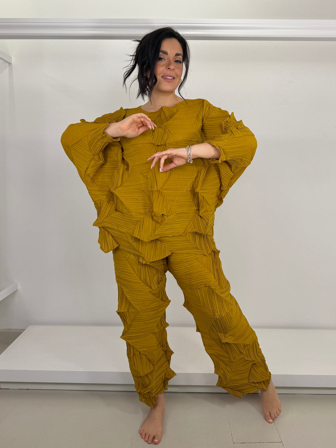 Eleganza in Movimento: Il Pantalone Plissé che Ti Valorizza