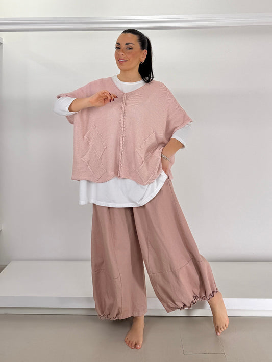 L'Eleganza del Filo: Il Gilet che Esalta Ogni Curva