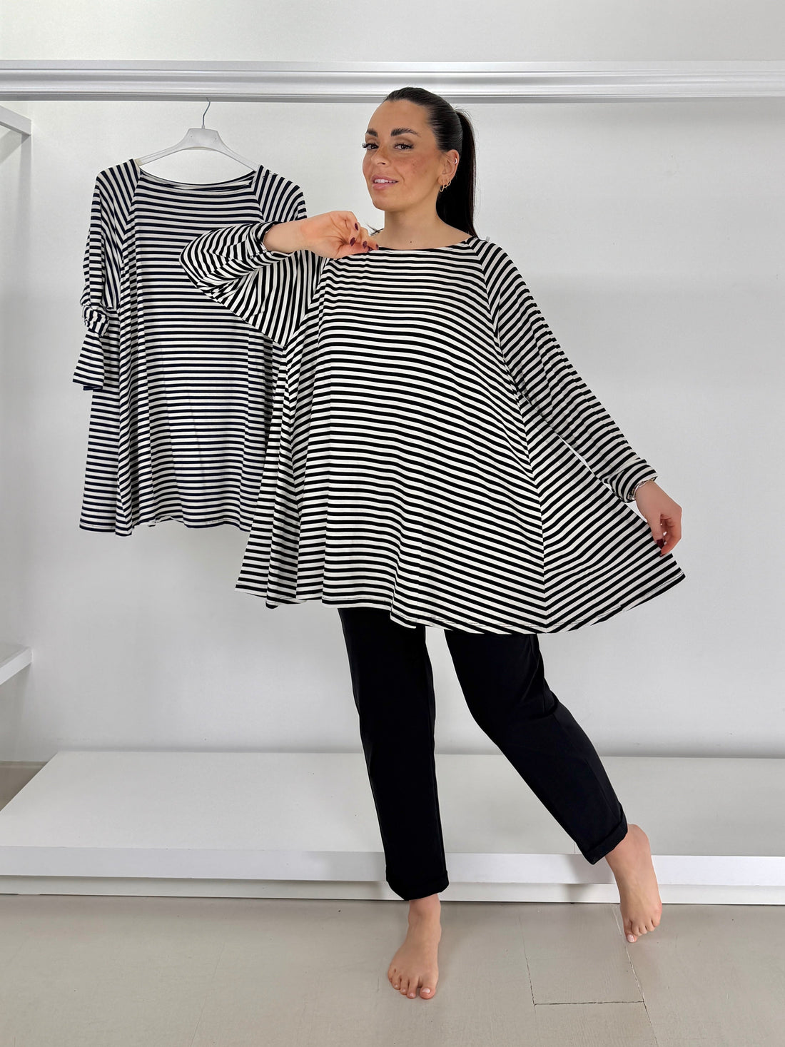 Maglia Ruota A Righe: il capo che valorizza le tue curve