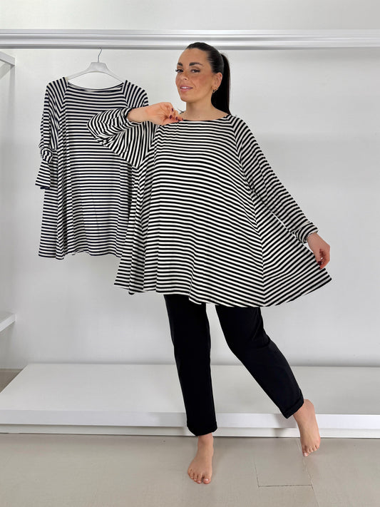 Maglia Ruota A Righe: il capo che valorizza le tue curve