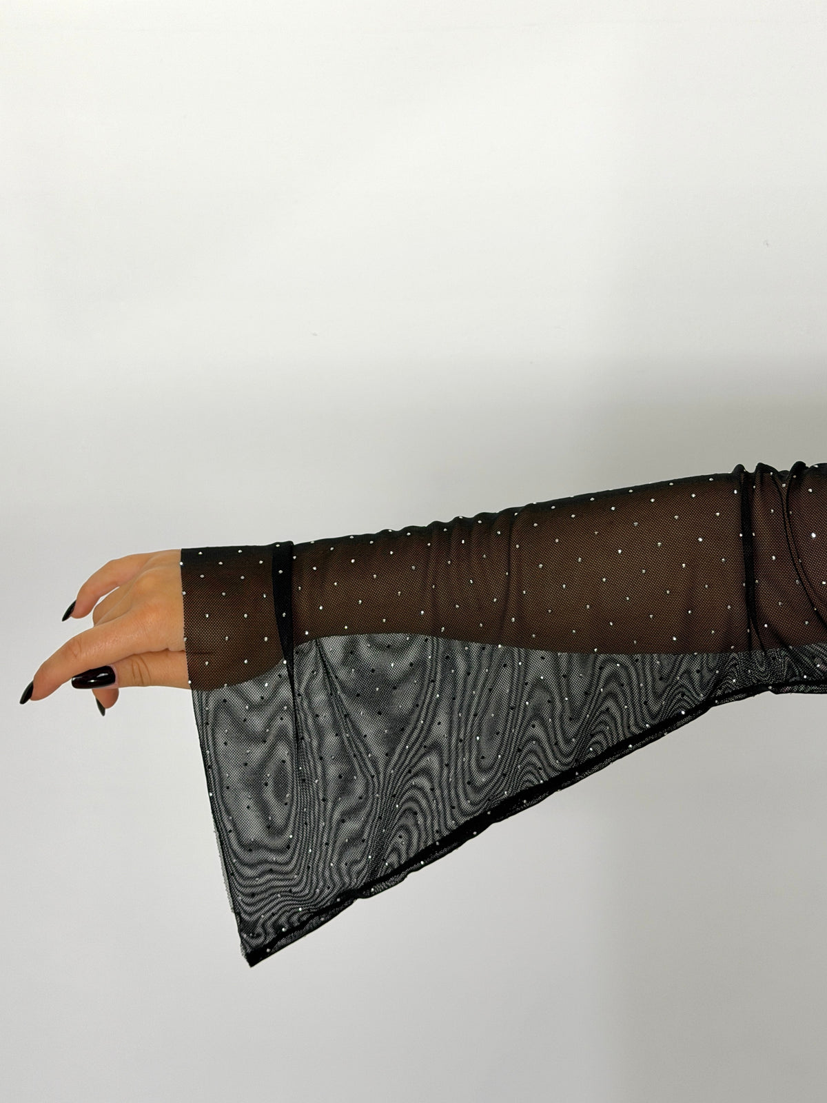 Casacca in tulle elasticizzato punti luce