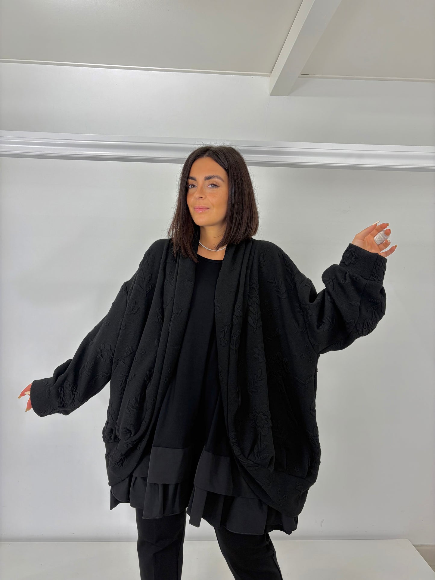 Cardigan ovetto tessuto lavorato