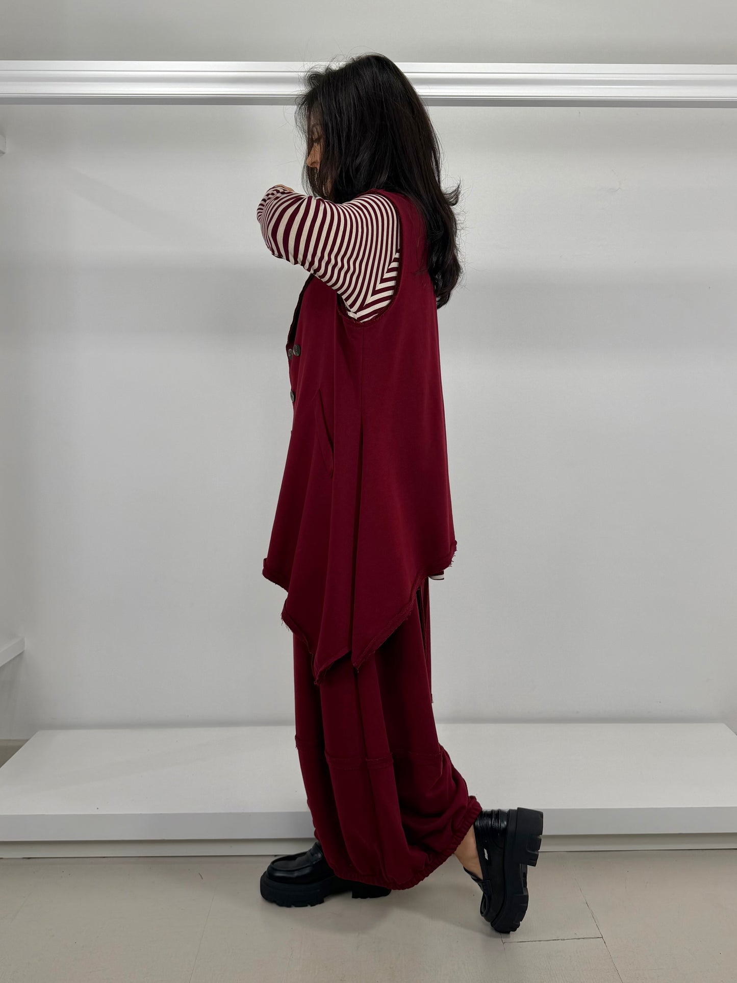 Gilet garzato asimmetrico