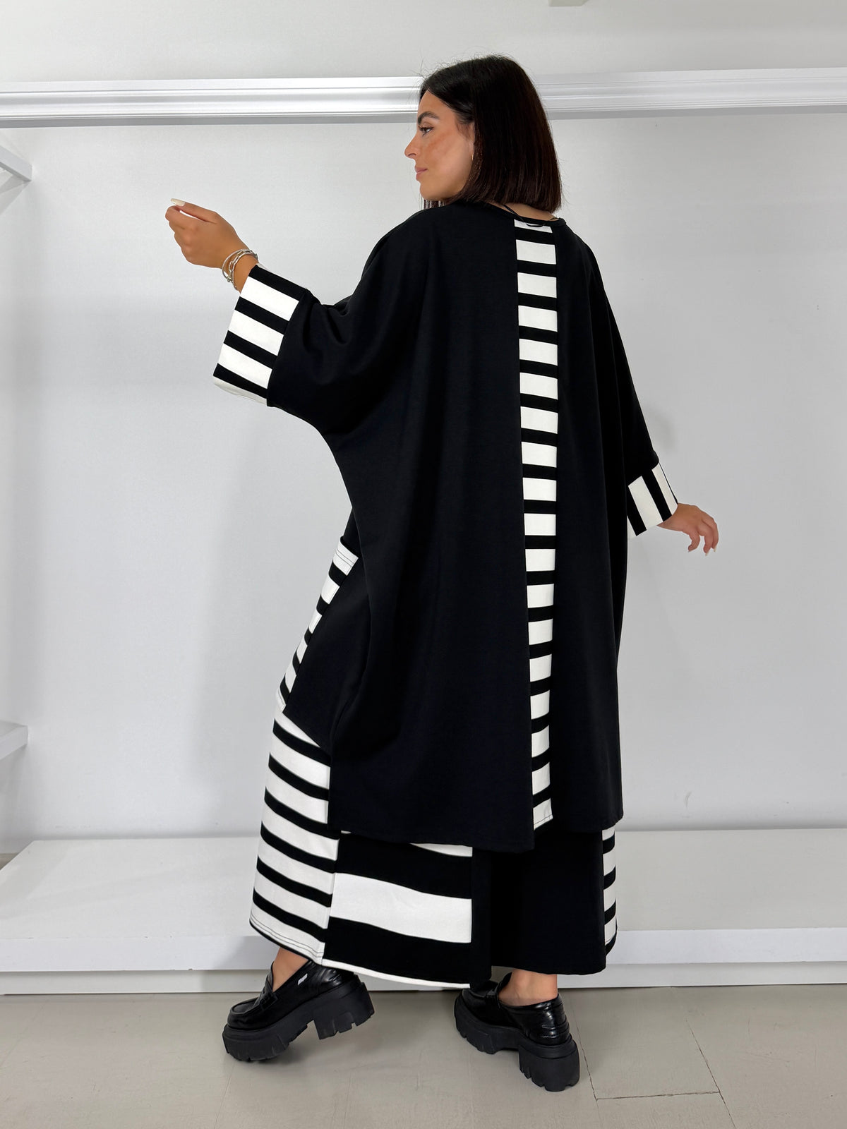 Pantalone gamba larga inserti righe