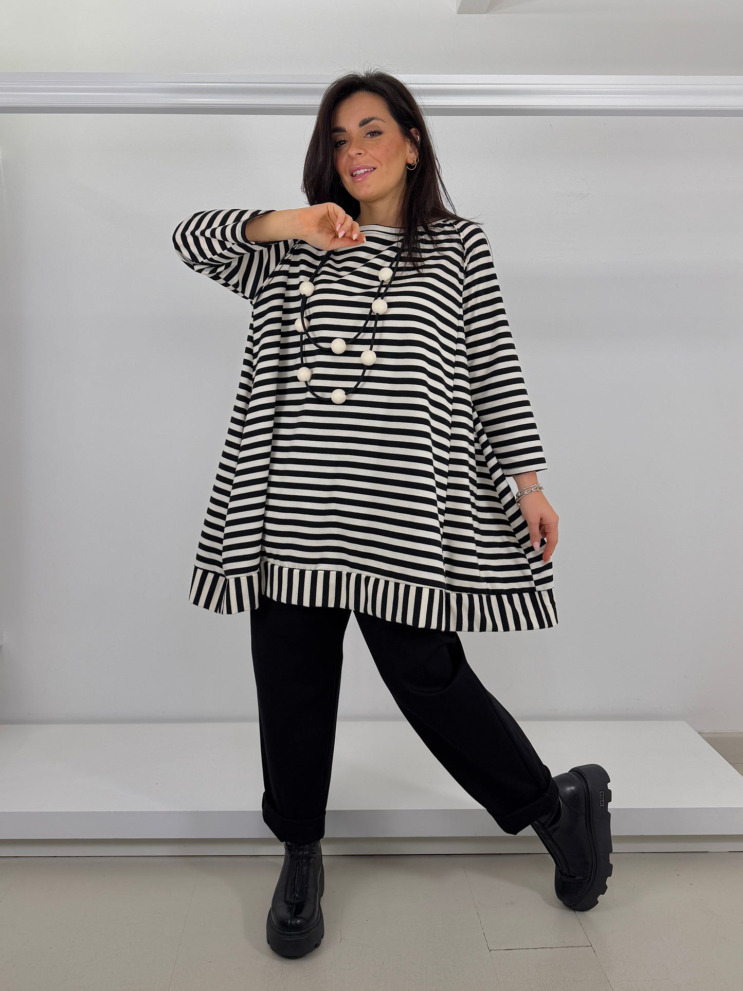 Maglia garzata svasata a righe