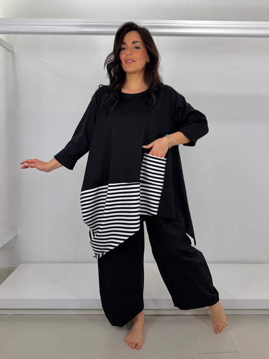 Pantalone punto roma gamba larga ovetto