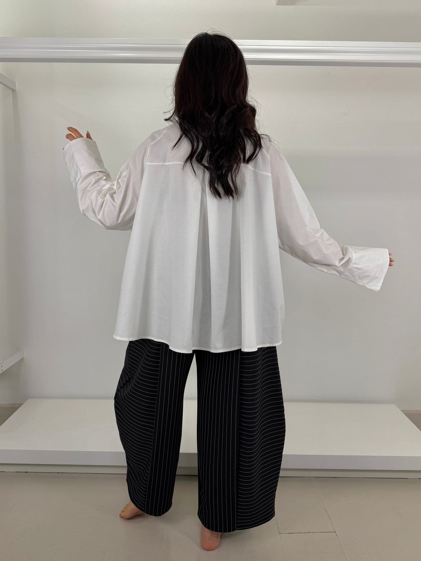Camicia con tasca chiusura asimmetrica