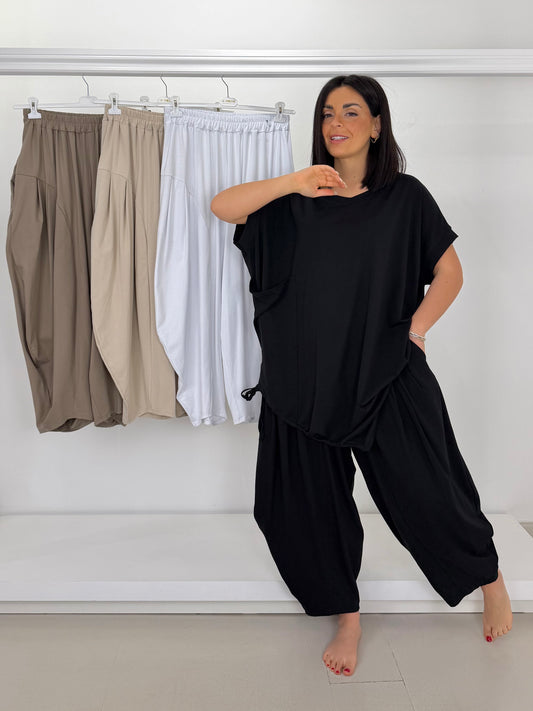 Pantalone ovetto con pence in maglina di cotone