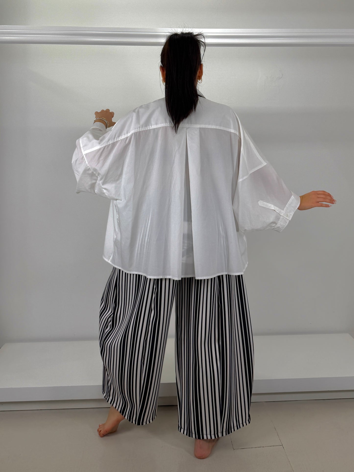 Pantalone gamba larga ovetto a righe