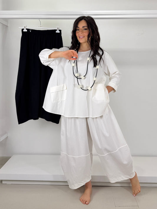 Pantalone punto roma gamba larga ovetto