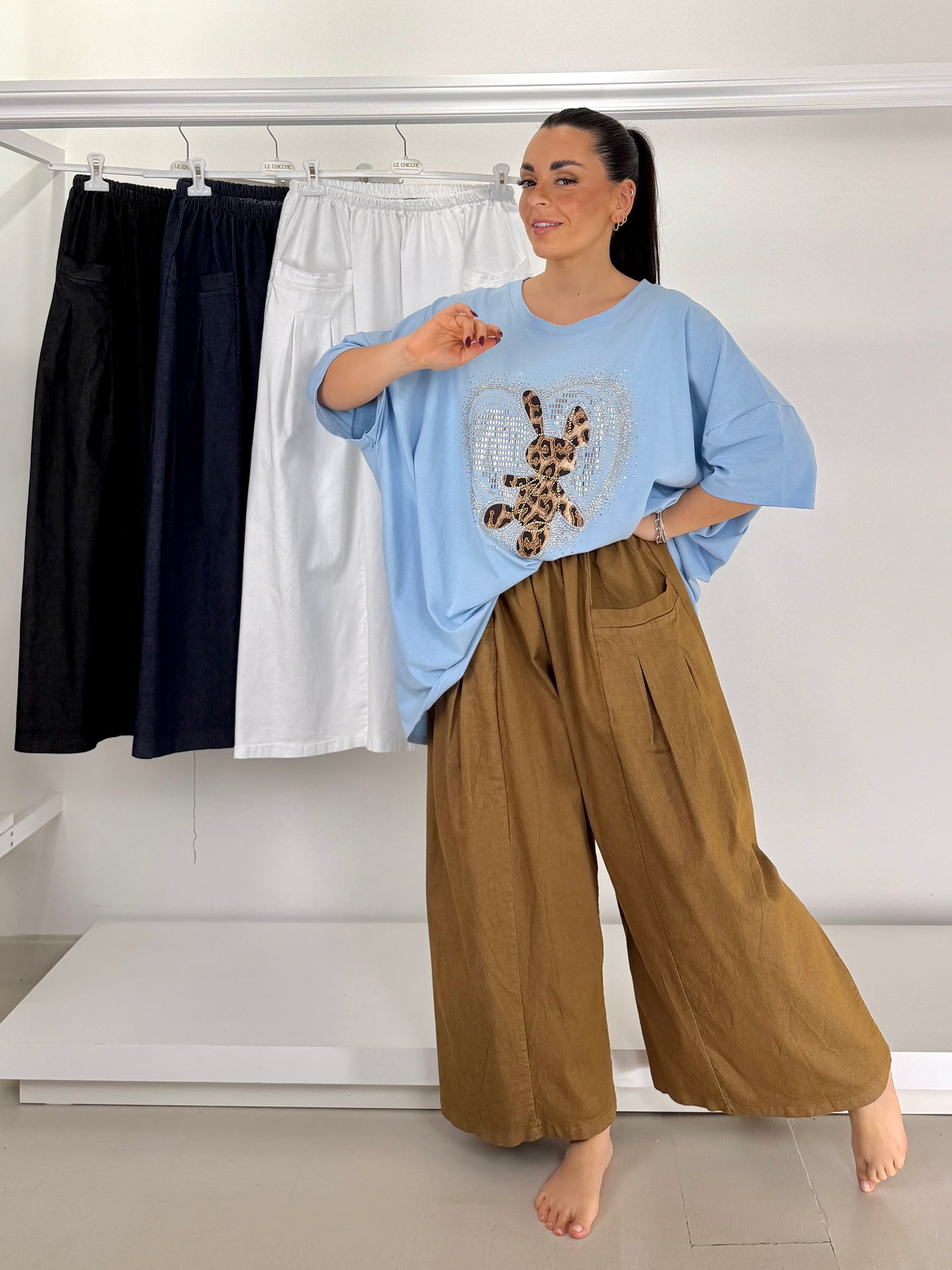 Pantalone effetto jeans gamba larga