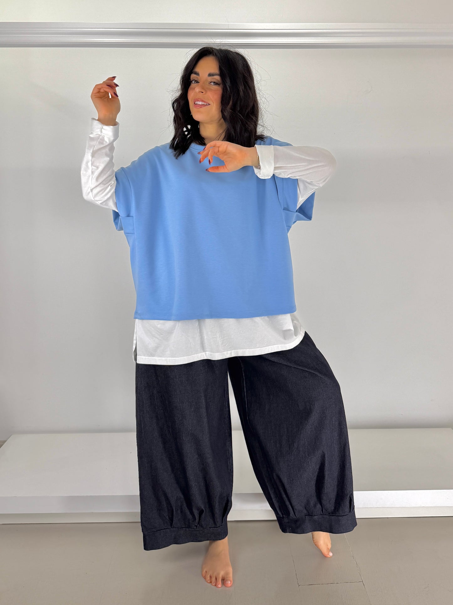 Pantalone effetto jeans fondo pence