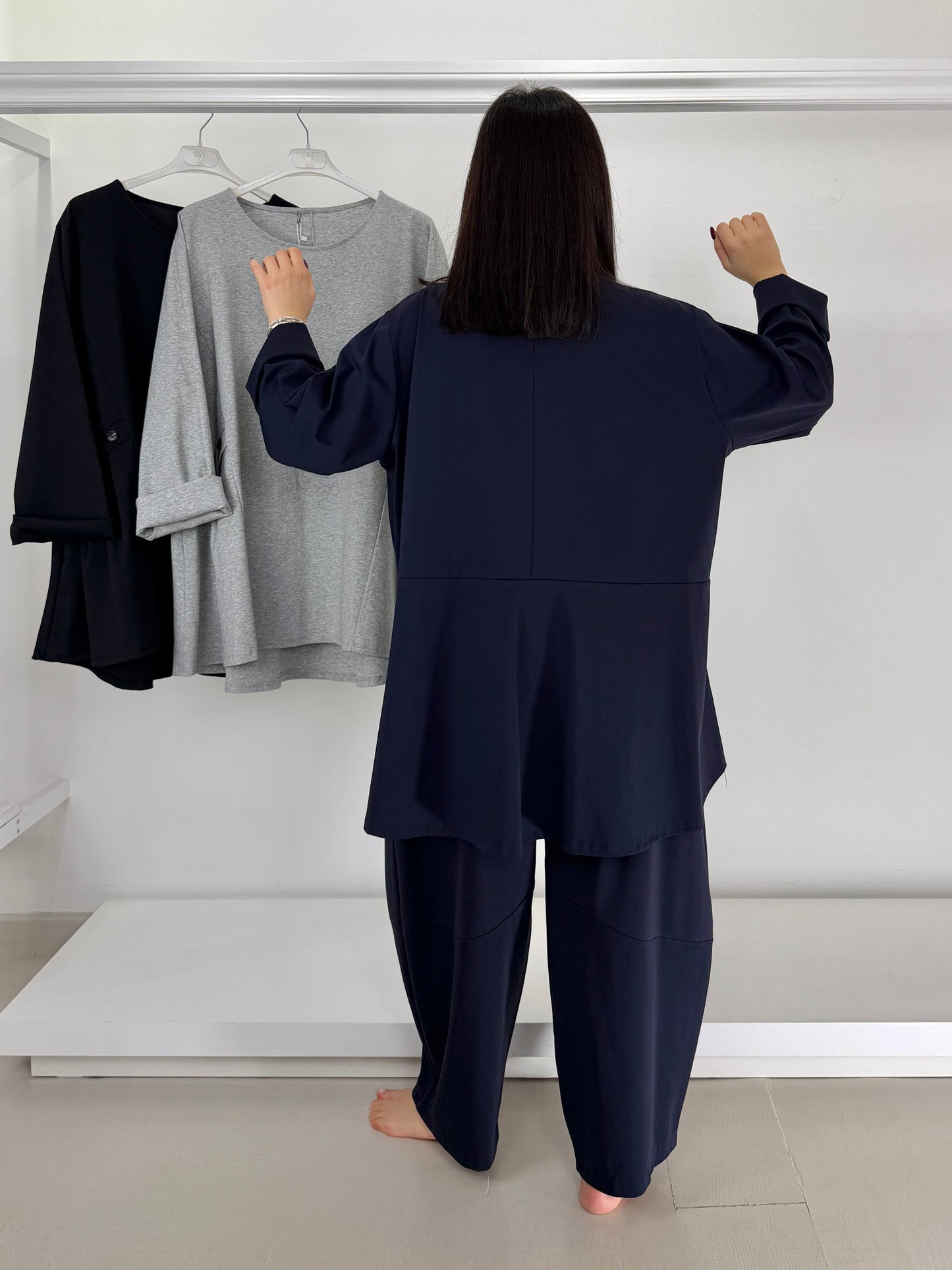 Maglia punto roma con pieghe e bottoncini