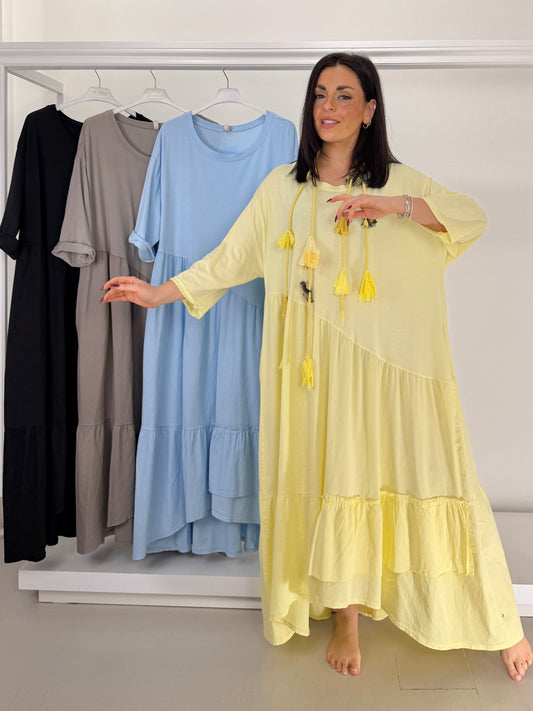 Abito due tessuti con balze