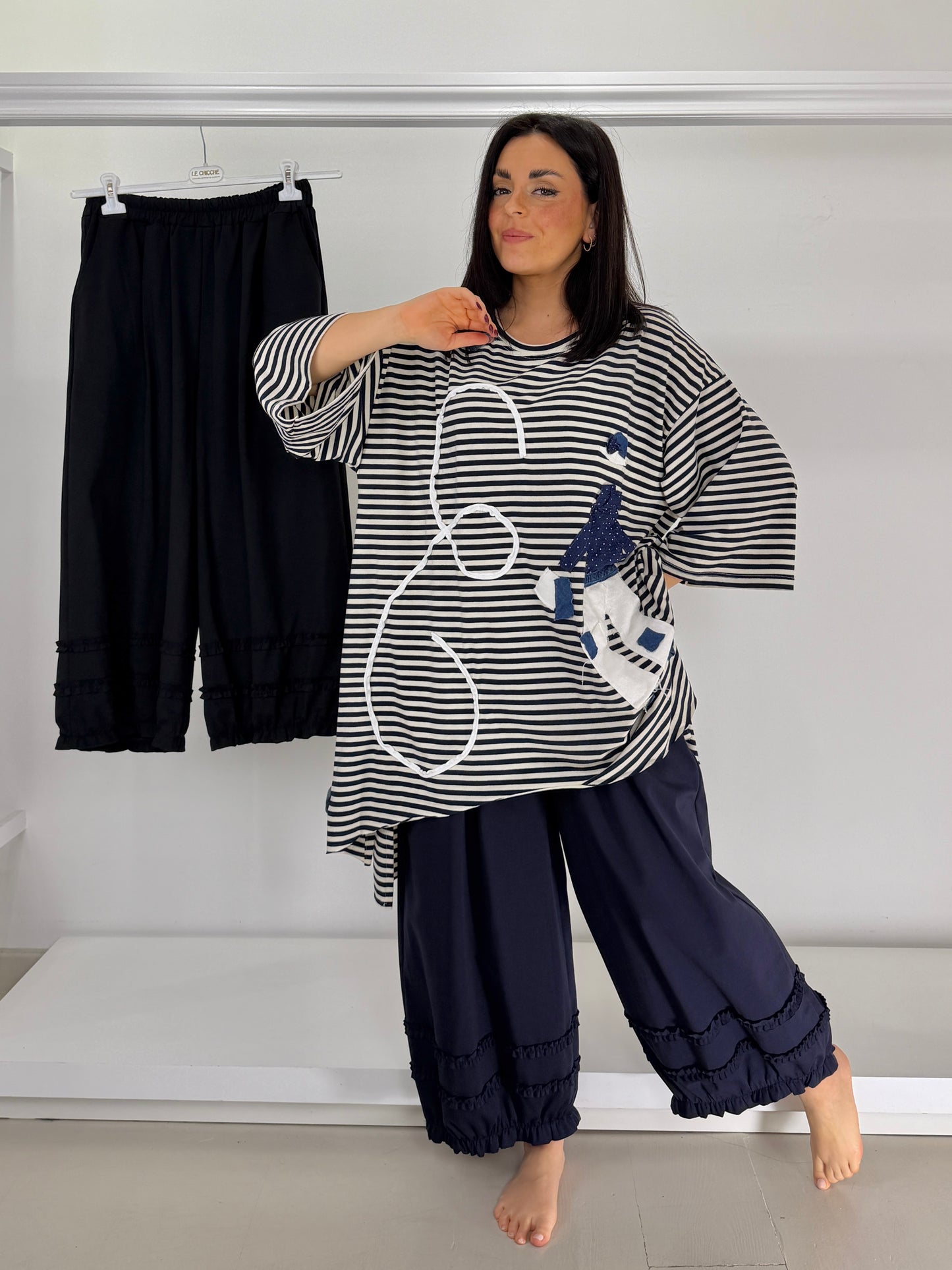 Pantalone punto roma con frappine