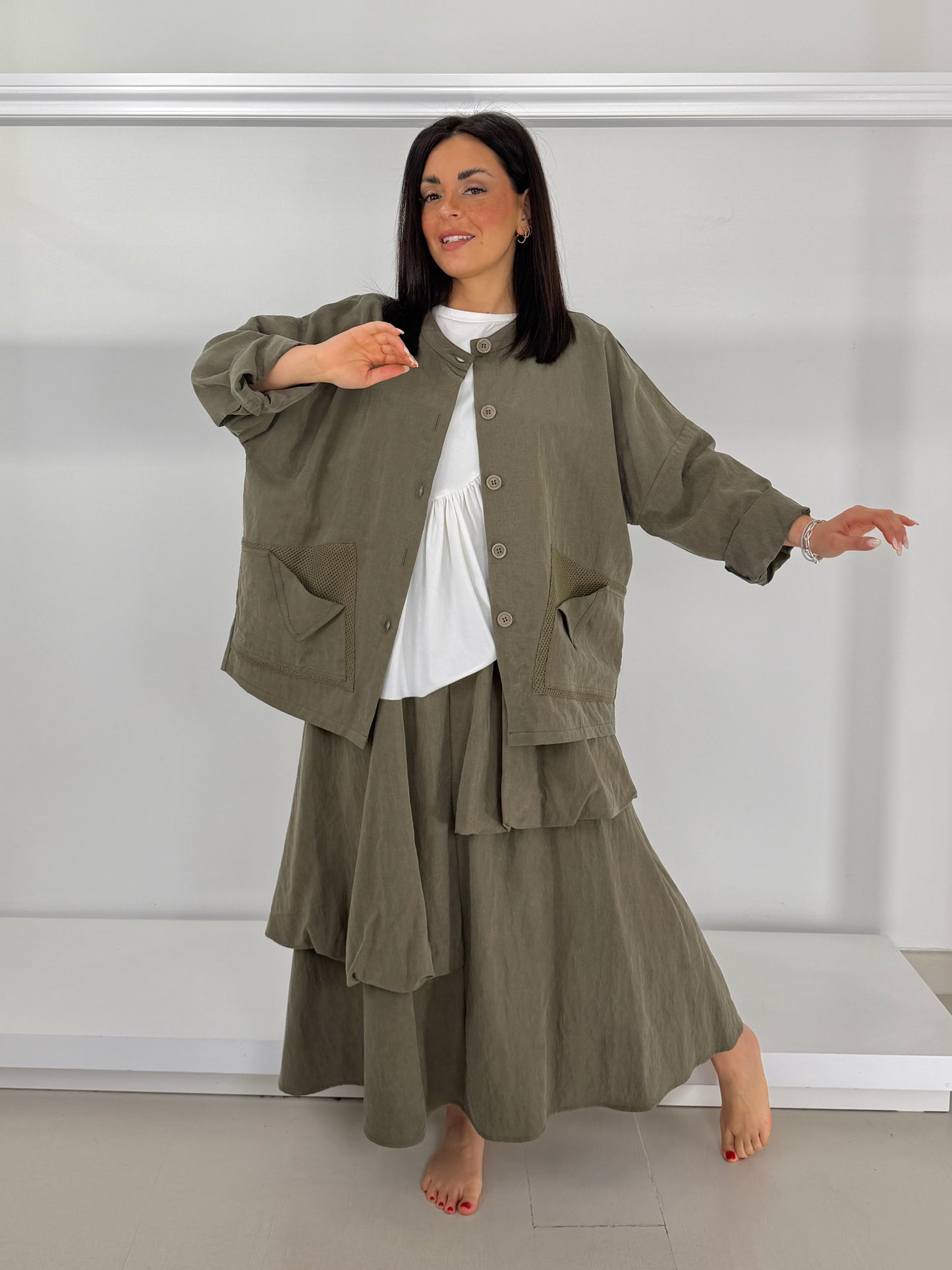 Giacca tasche due tessuti