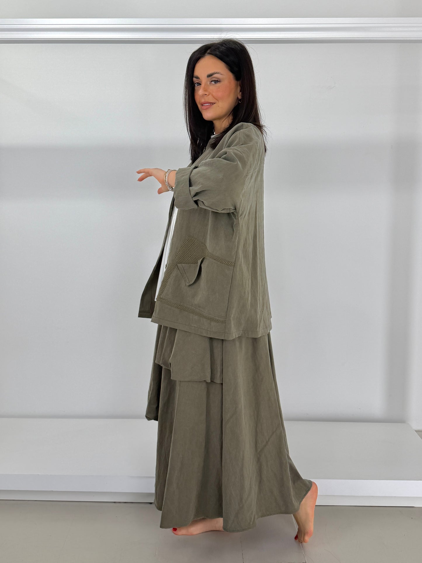 Giacca tasche due tessuti