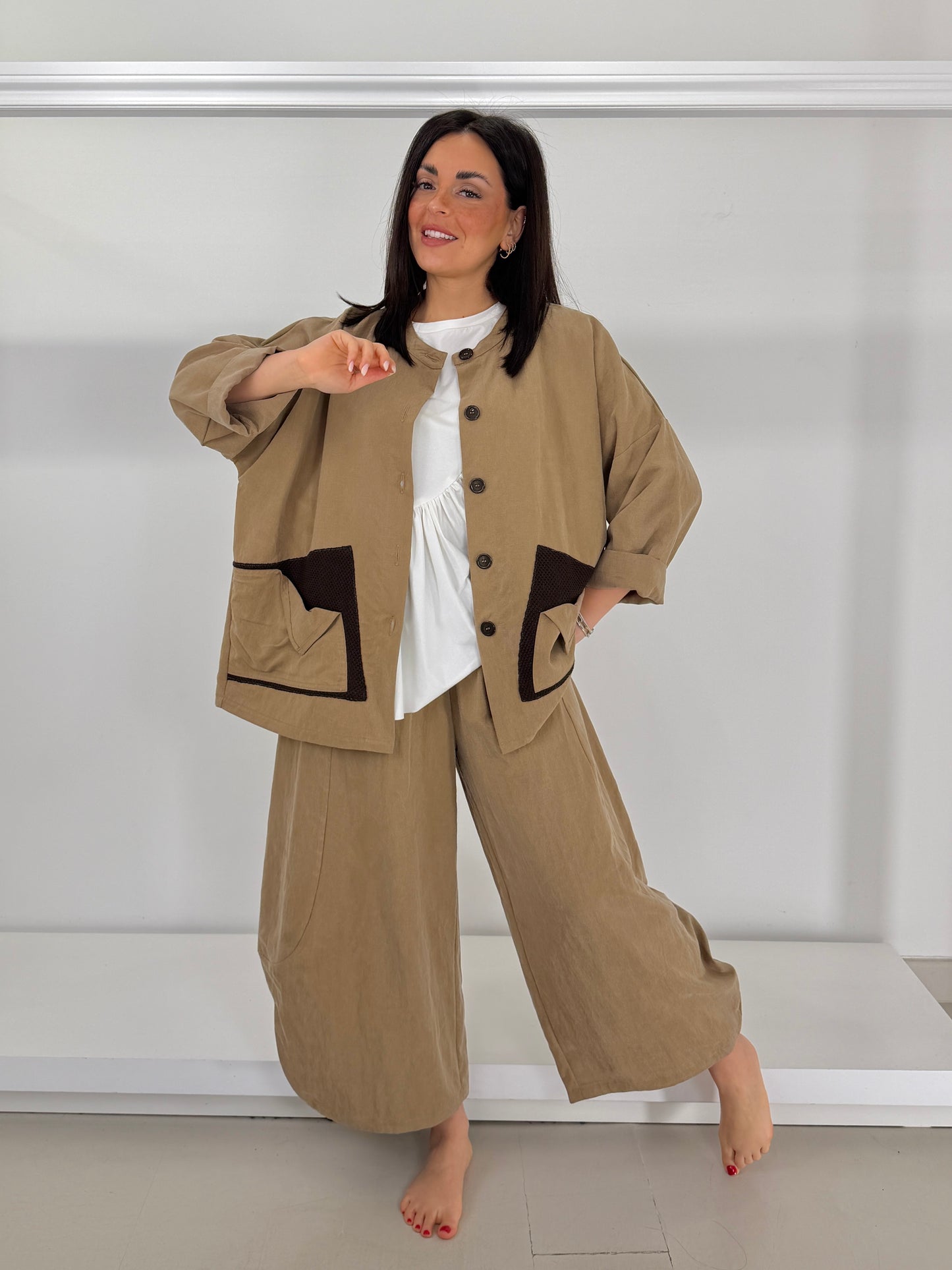 Giacca tasche due tessuti