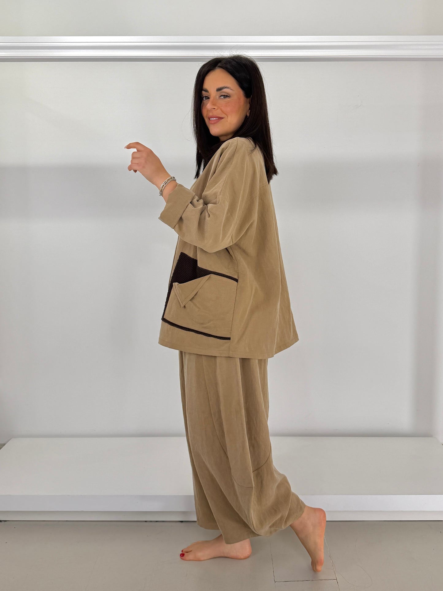 Giacca tasche due tessuti