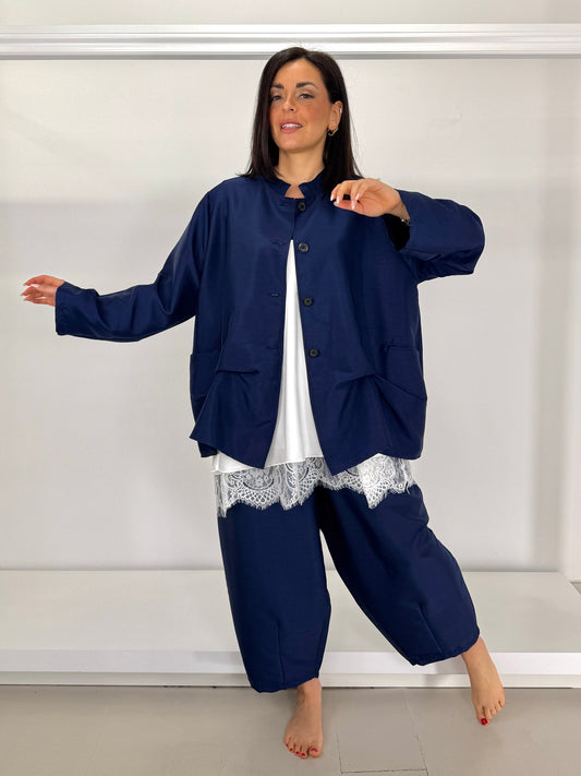 Pantalone raso tasca con patta