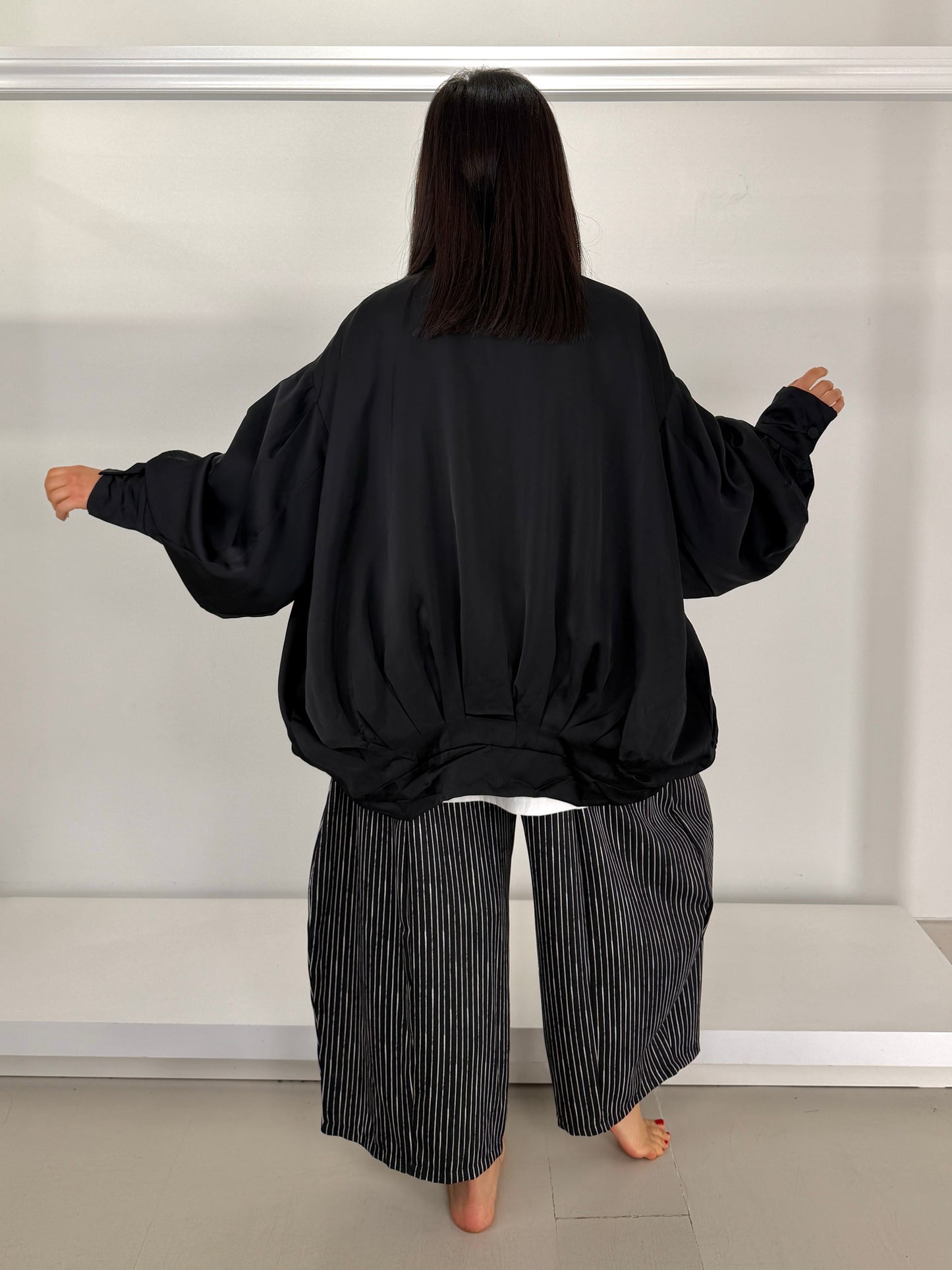 Pantalone gamba larga ovetto gessato irregolare