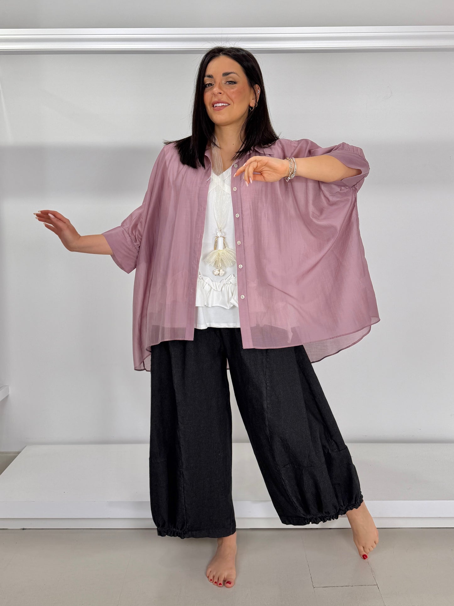 Pantalone effetto jeans fondo arricciato