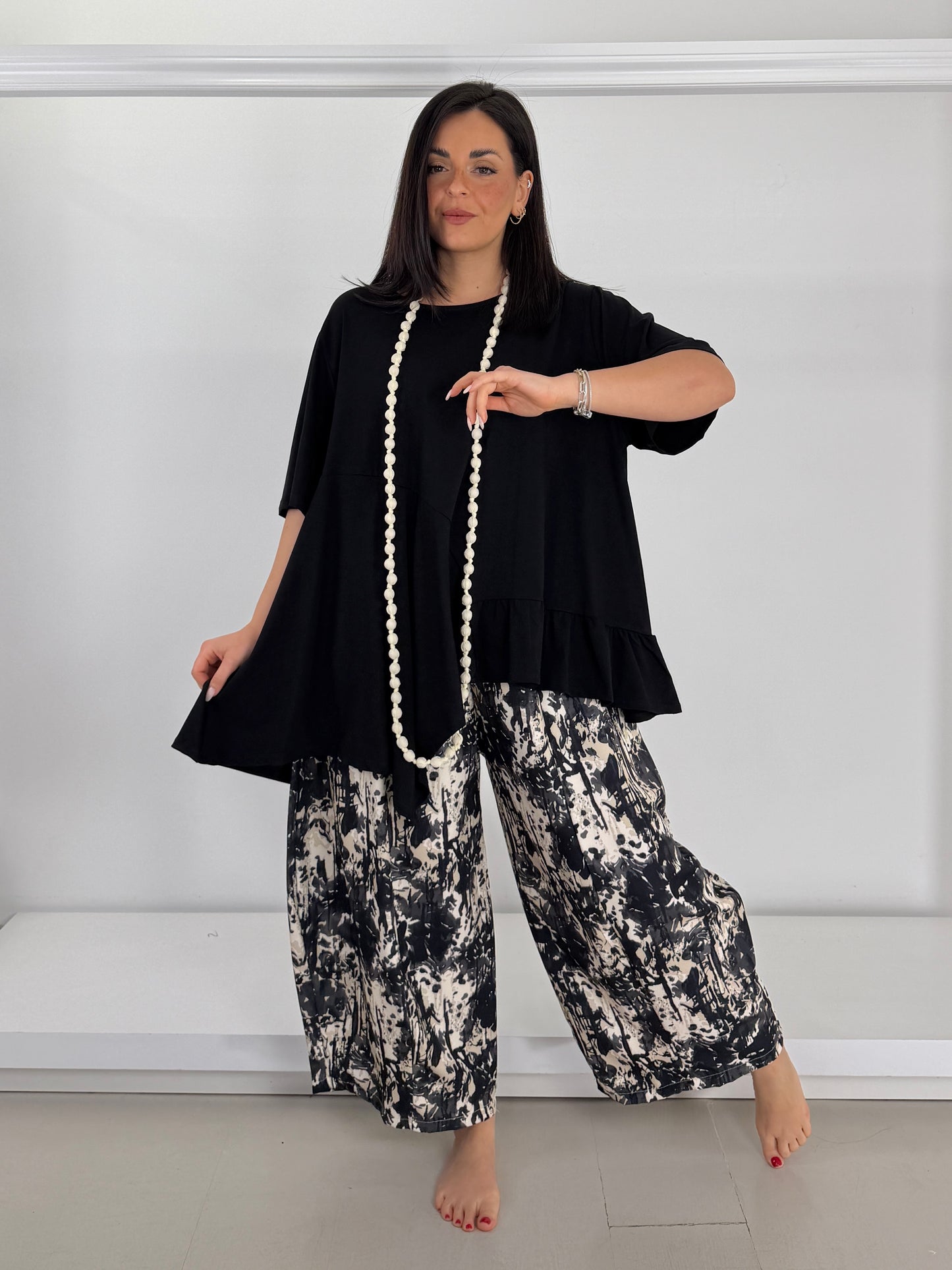 T-shirt asimmetrica con balzina