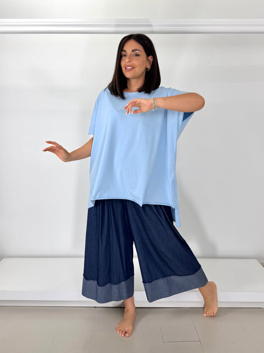 Maglia taglio vivo smanicata