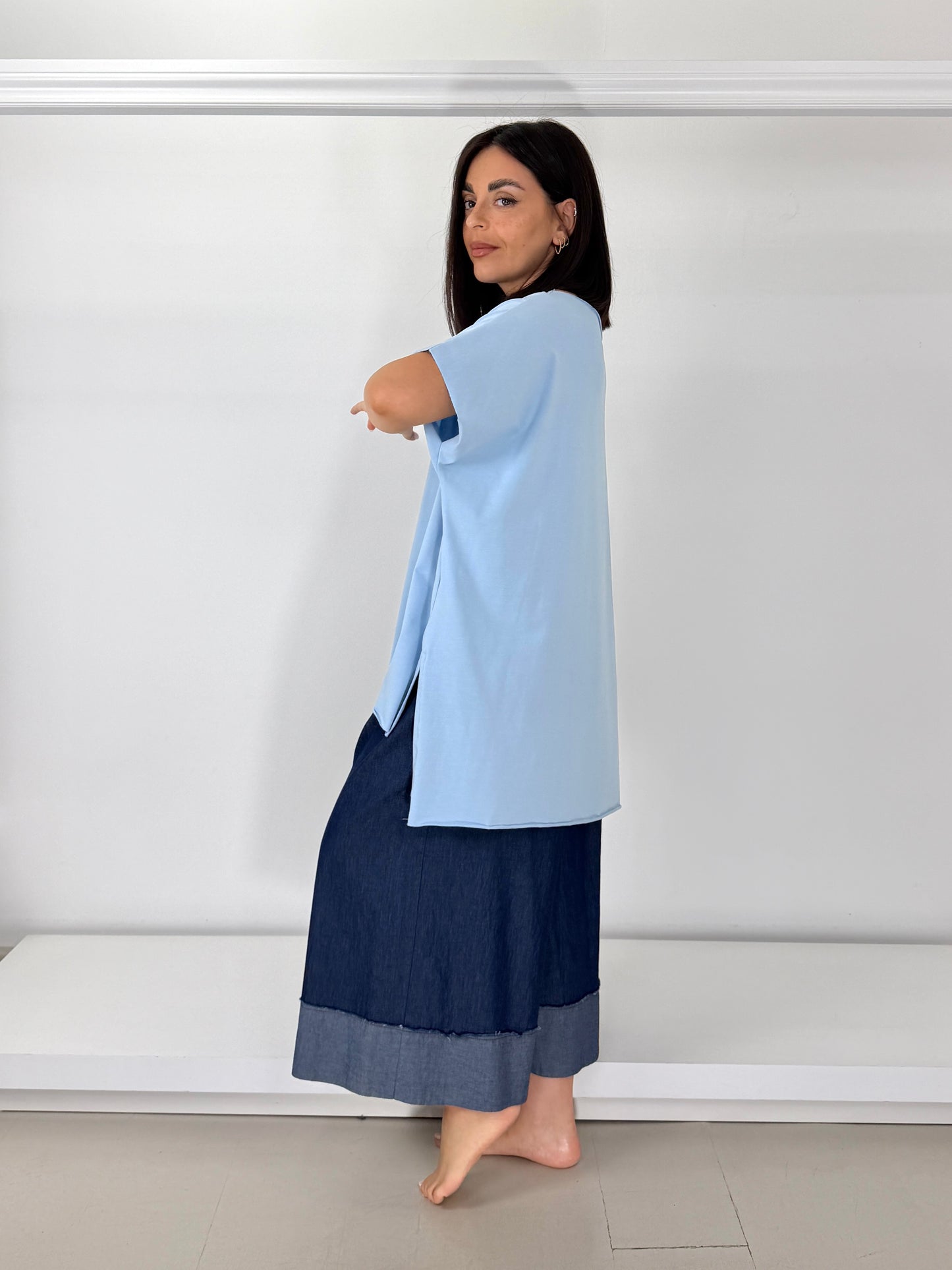 Maglia taglio vivo smanicata