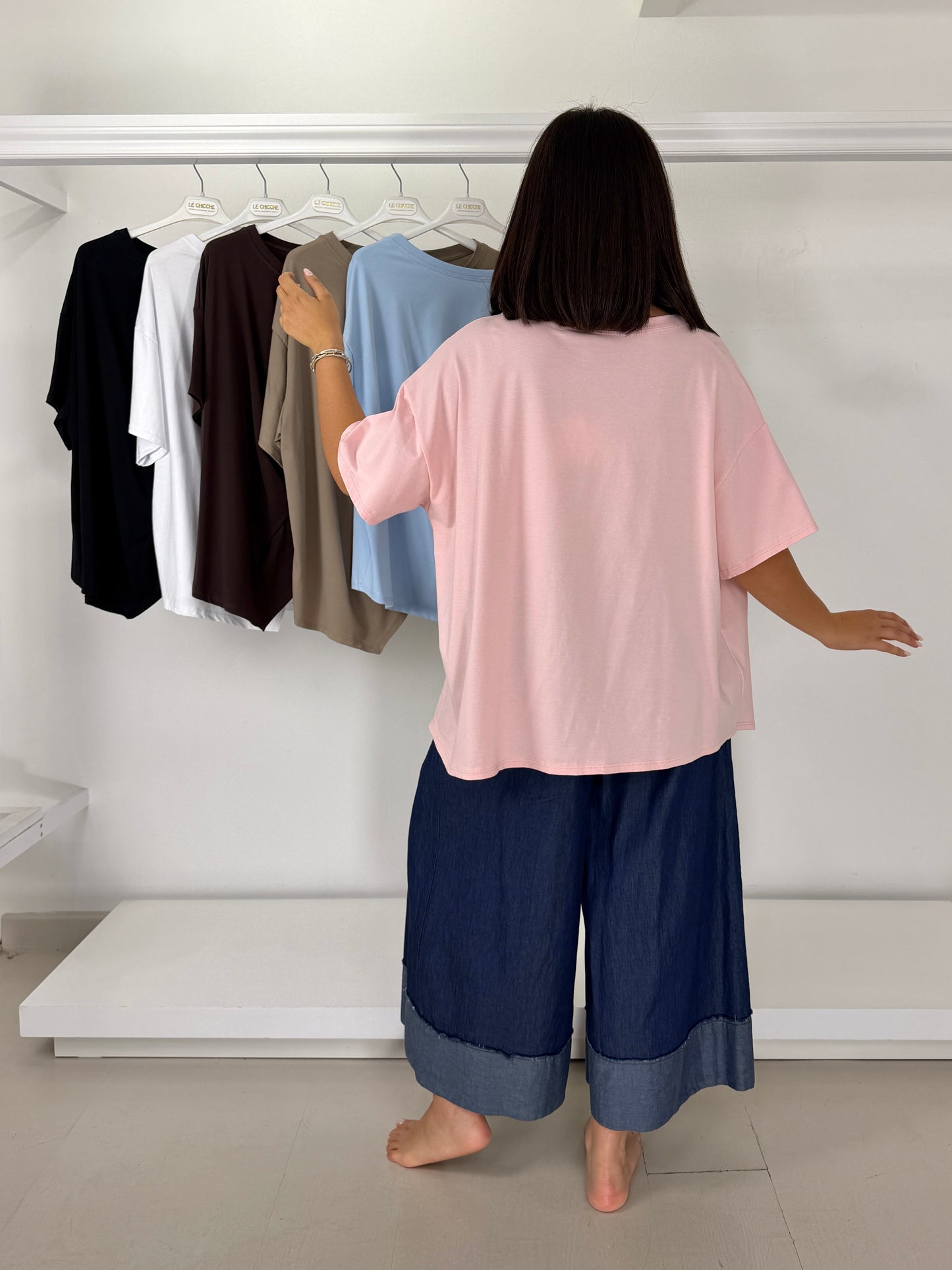 T-shirt asimmetrica con pieghe