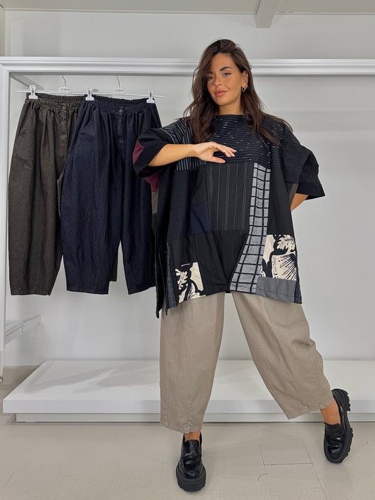 Pantalone ovetto con bottone effetto jeans elasticizzato