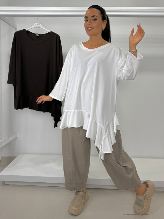 Maglia asimmetrica con balza