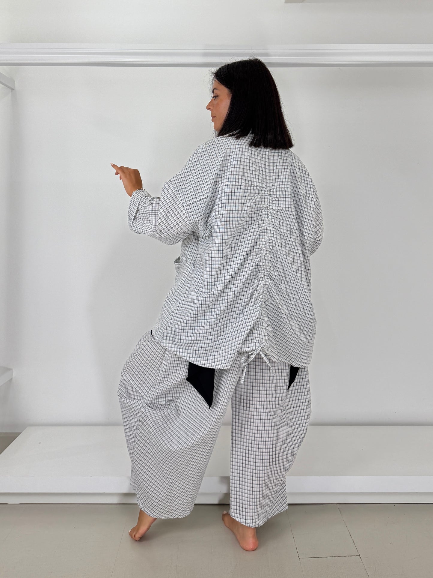 Giacca con coulisse dietro - trama irregolare