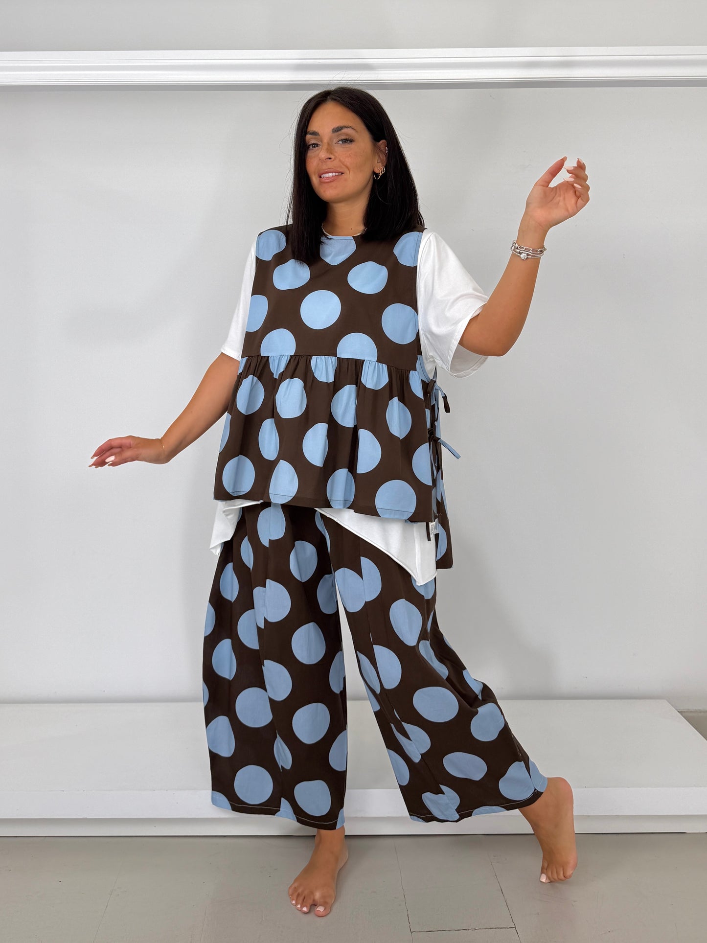 Gilet con fiocchetti - bolli