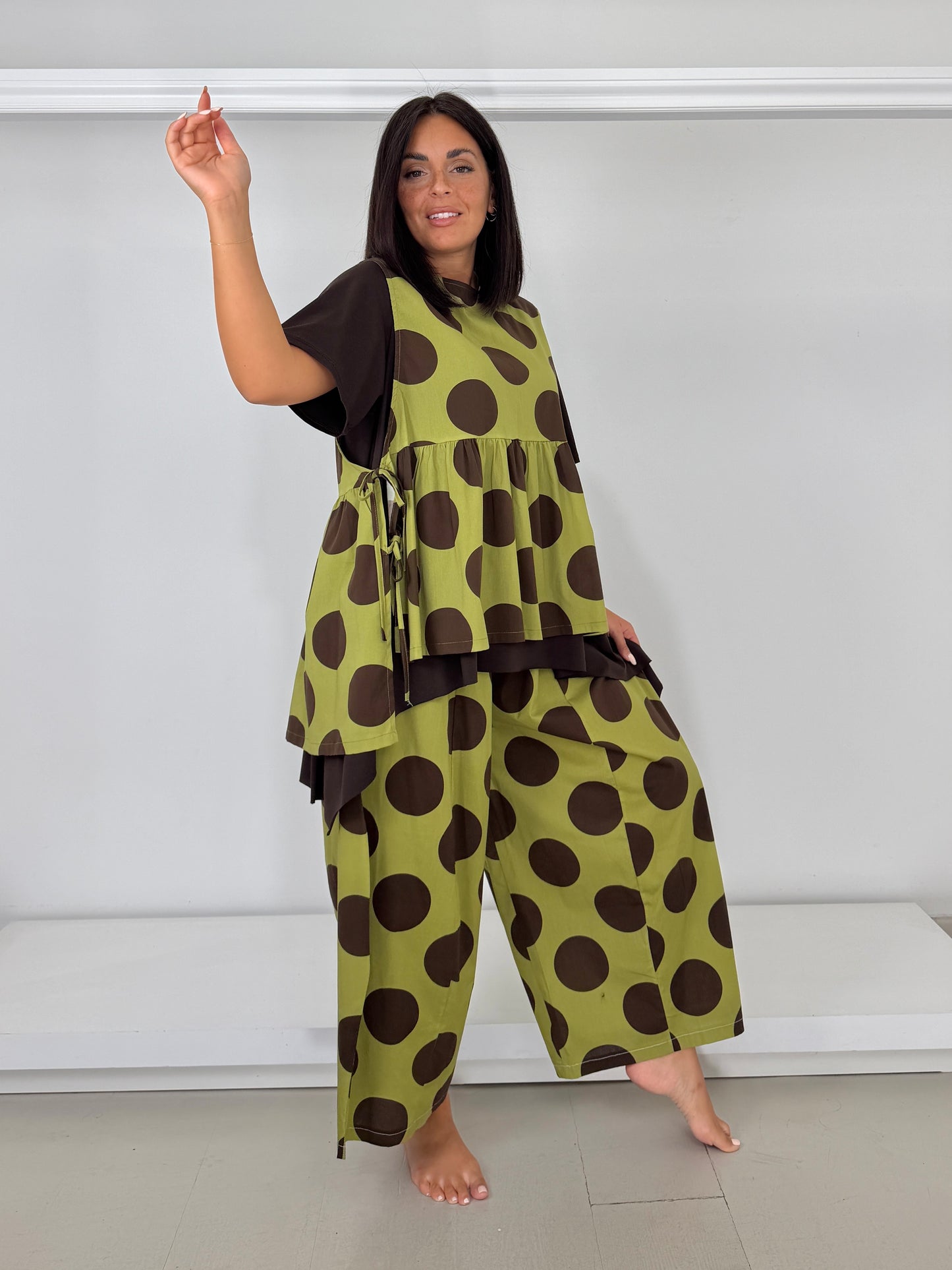 Gilet con fiocchetti - bolli