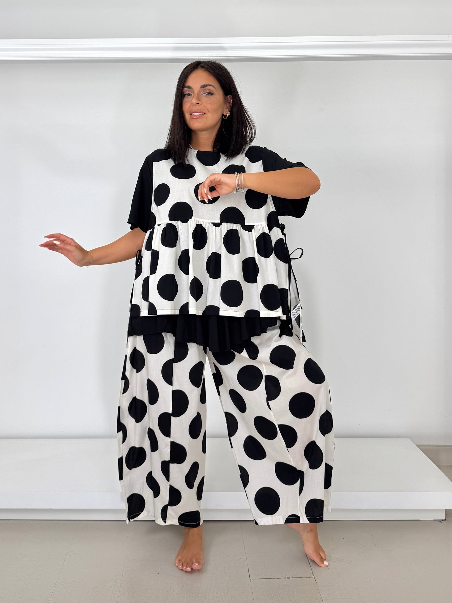 Gilet con fiocchetti - bolli