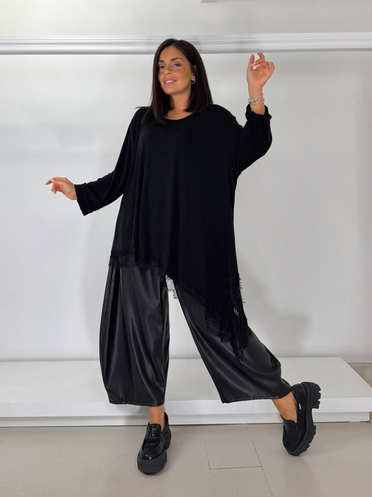 Maglia asimmetrica fondo pizzo