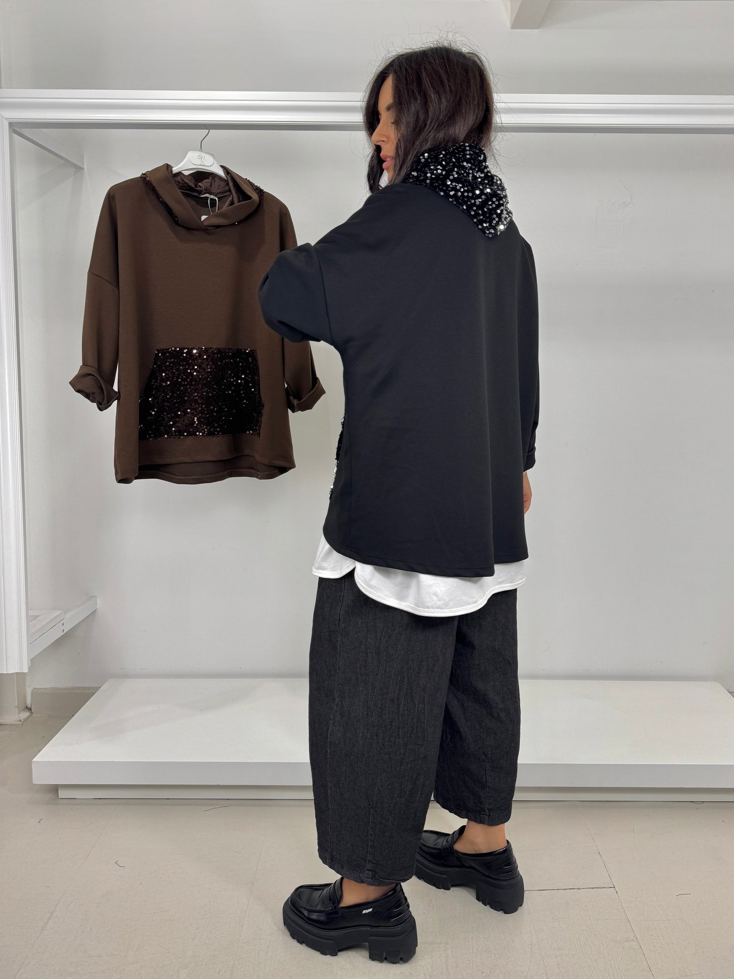 Maglia con tasca paillettes