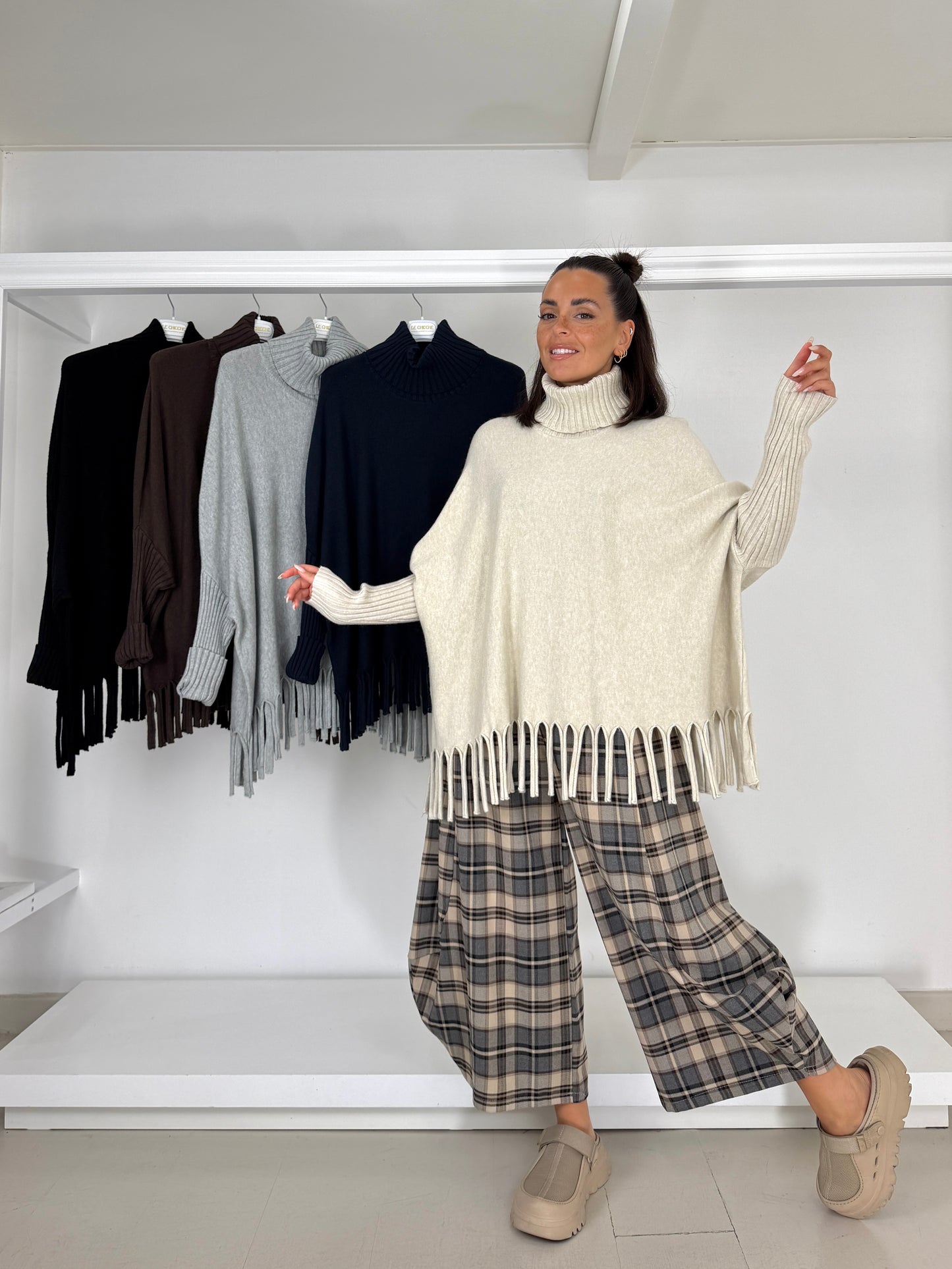 Pullover dolcevita con frange