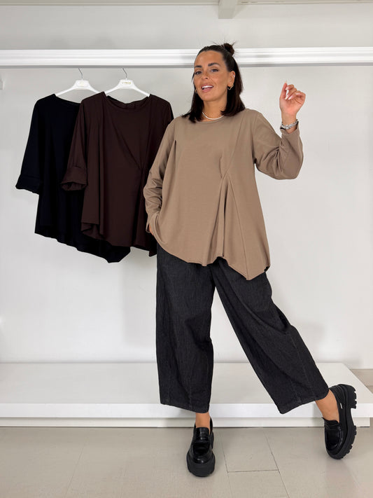 Maglia con drappeggio asimmetrico