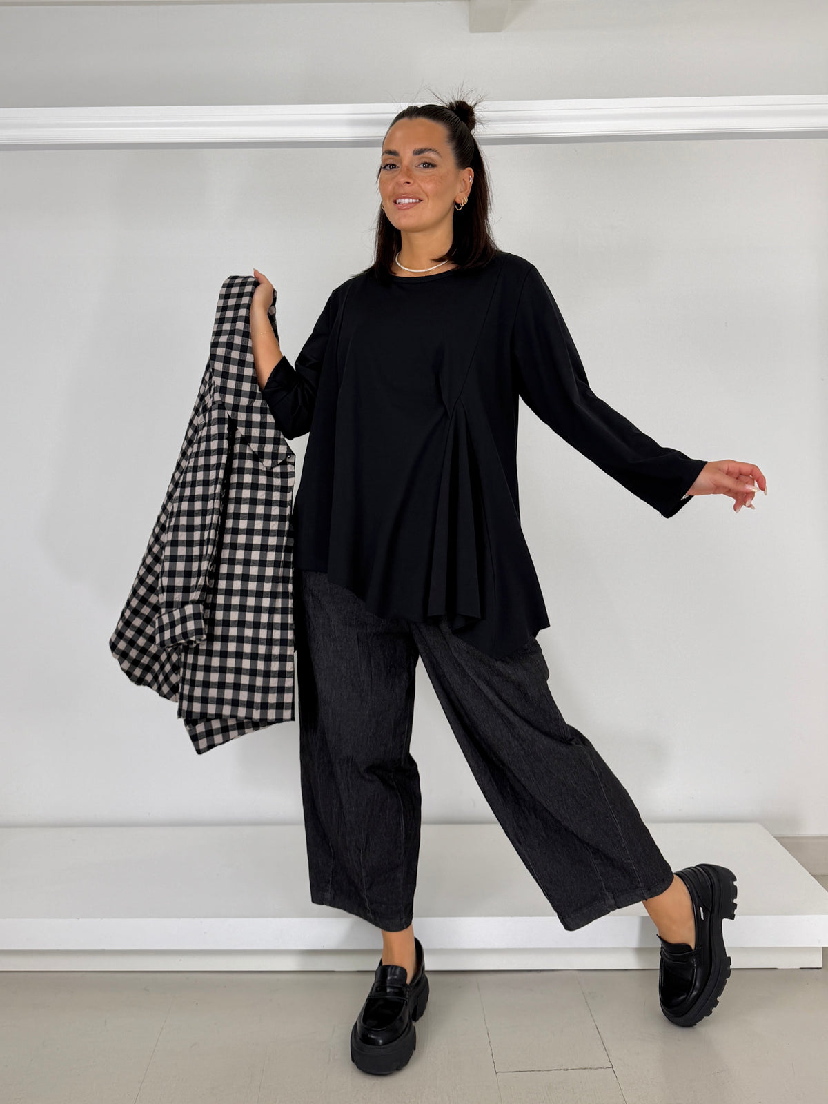 Maglia con drappeggio asimmetrico