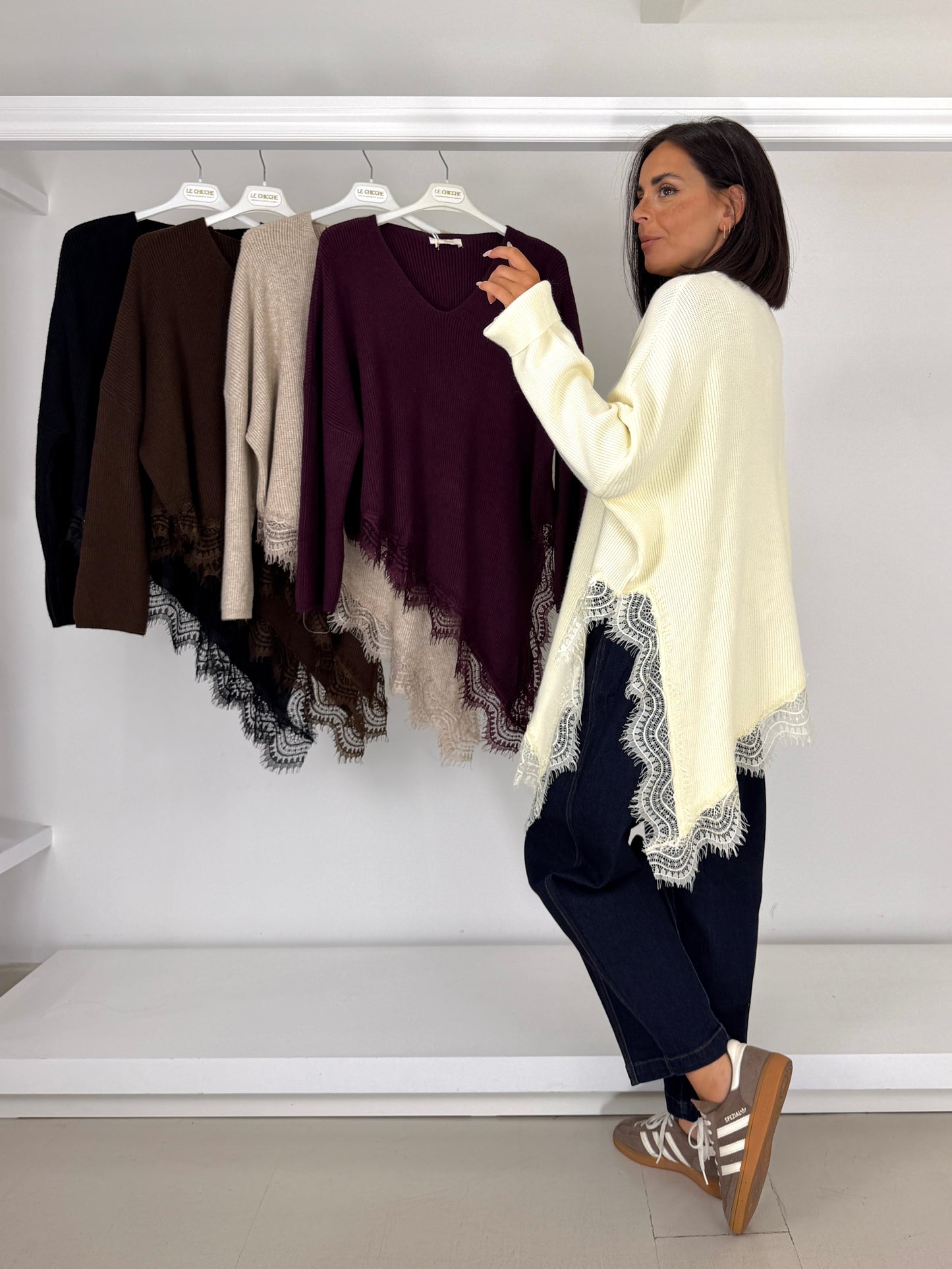 Pullover costine asimmetrico fondo pizzo