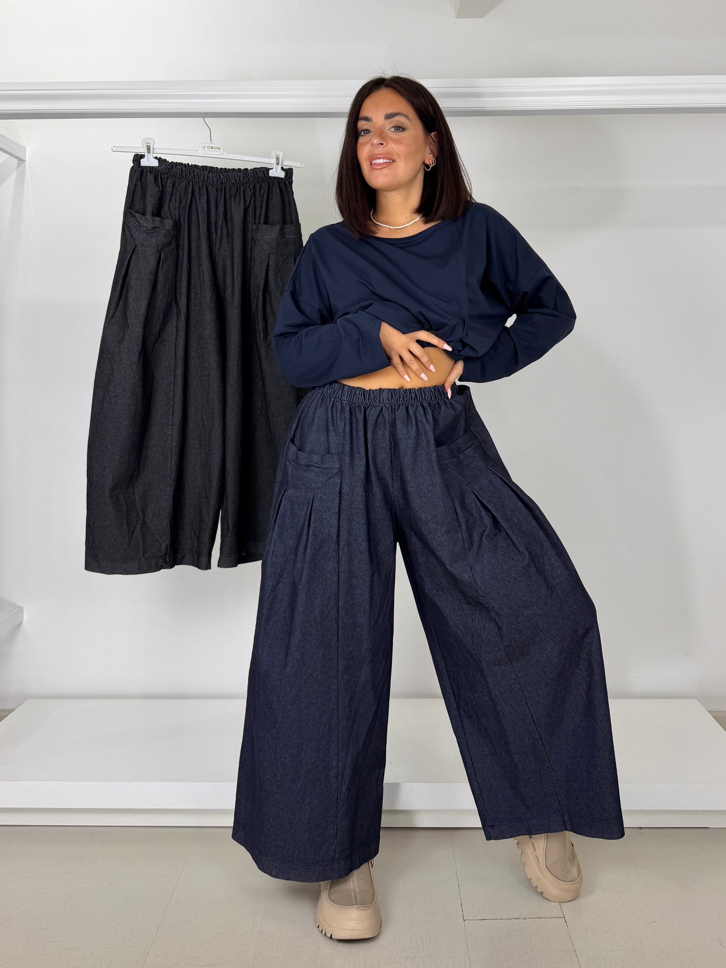 Pantalone effetto jeans gamba larga